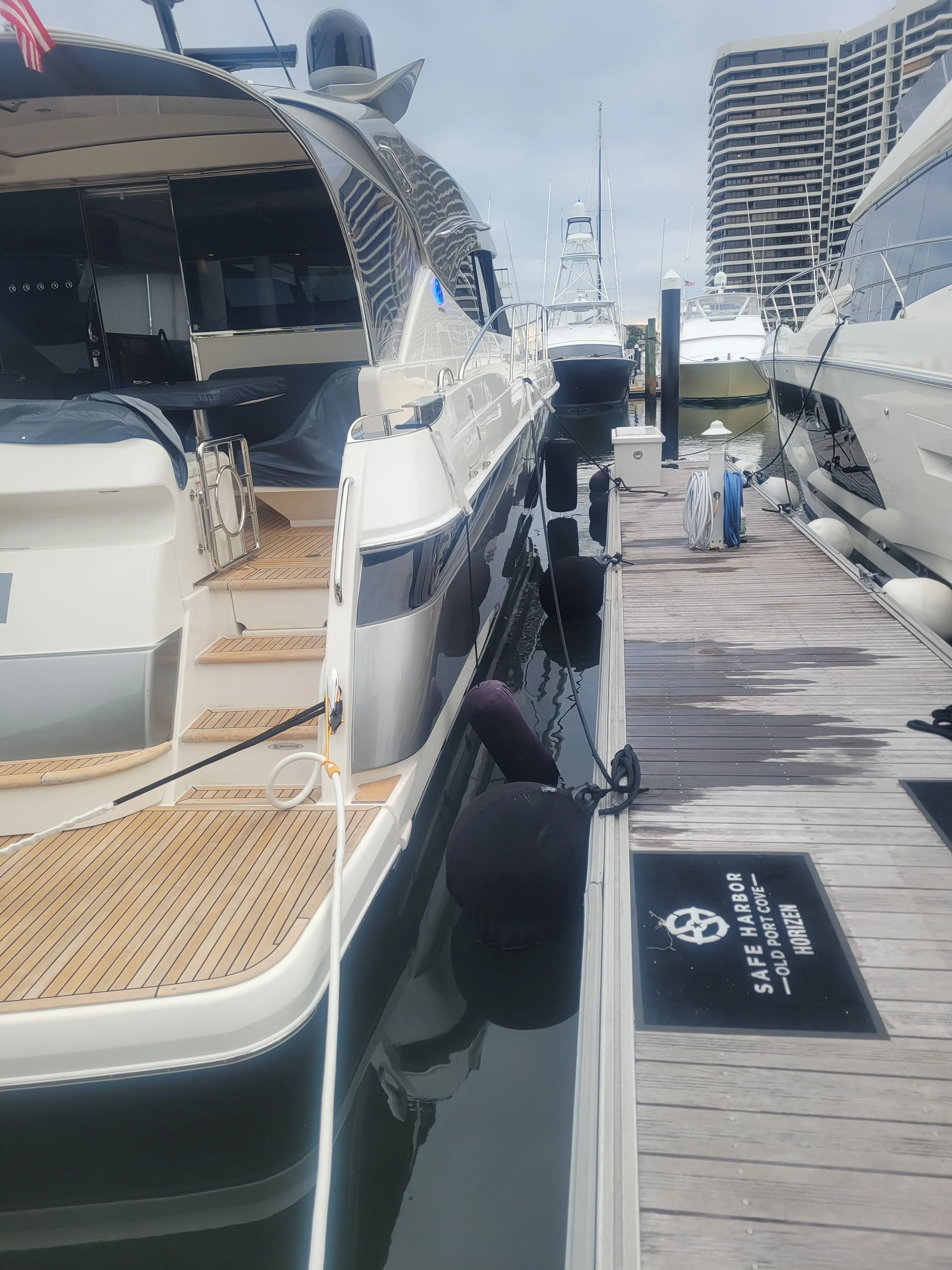 Yacht docked at marina — professional dock side care